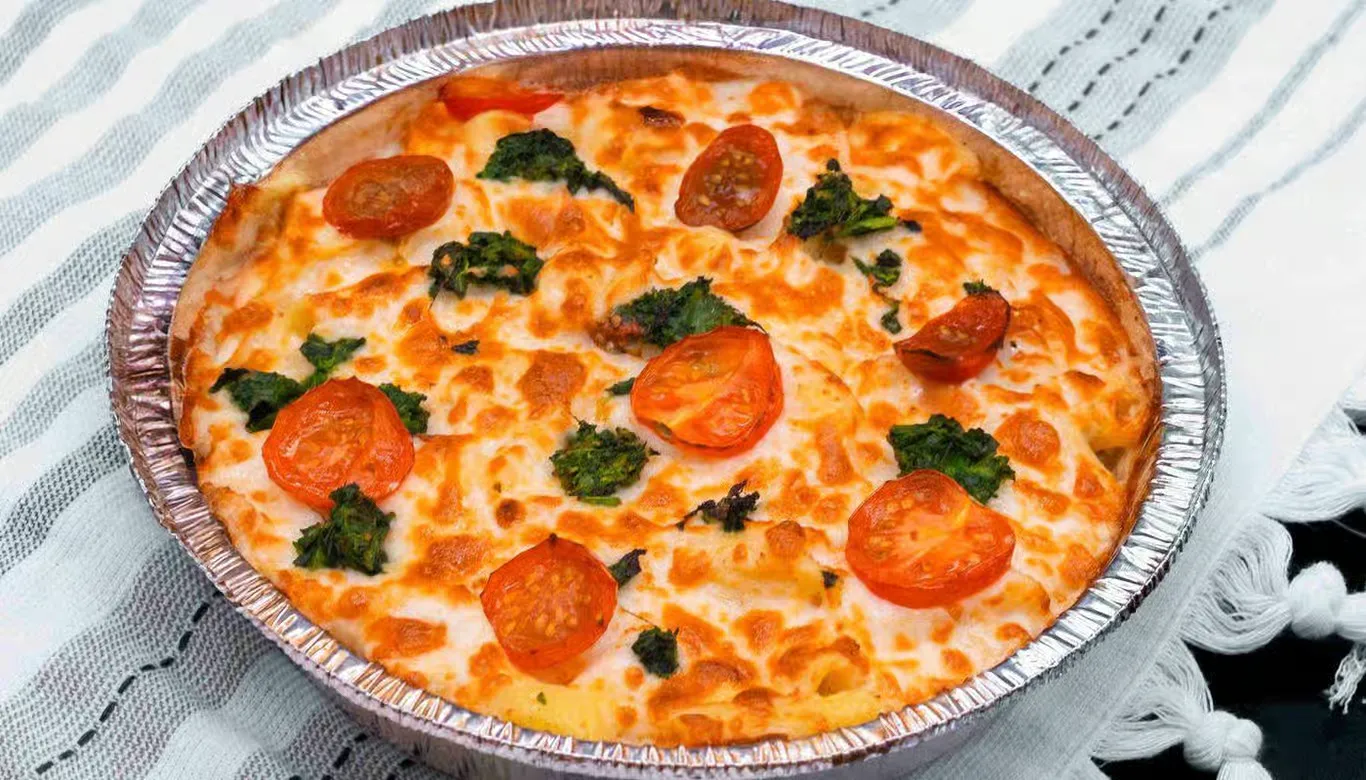 Signature pizza with fresh toppings at La Farina Winnipeg